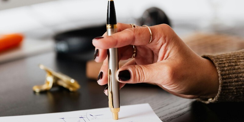 person with pen